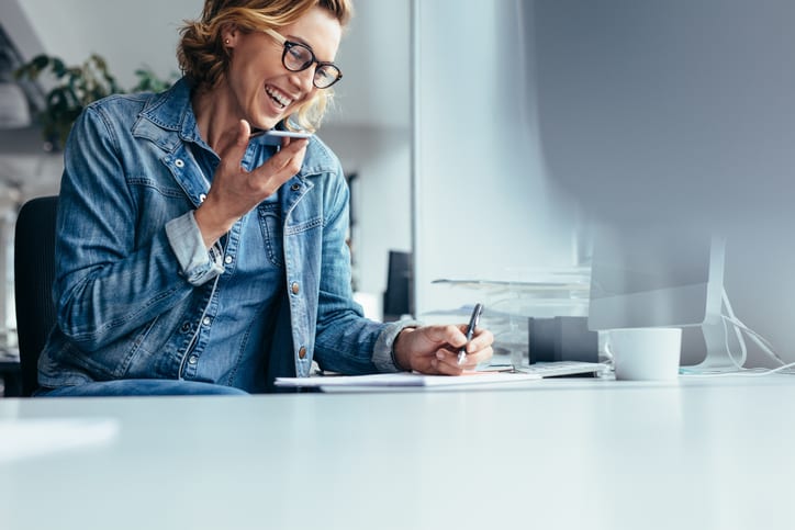 Young female executive working in office. 