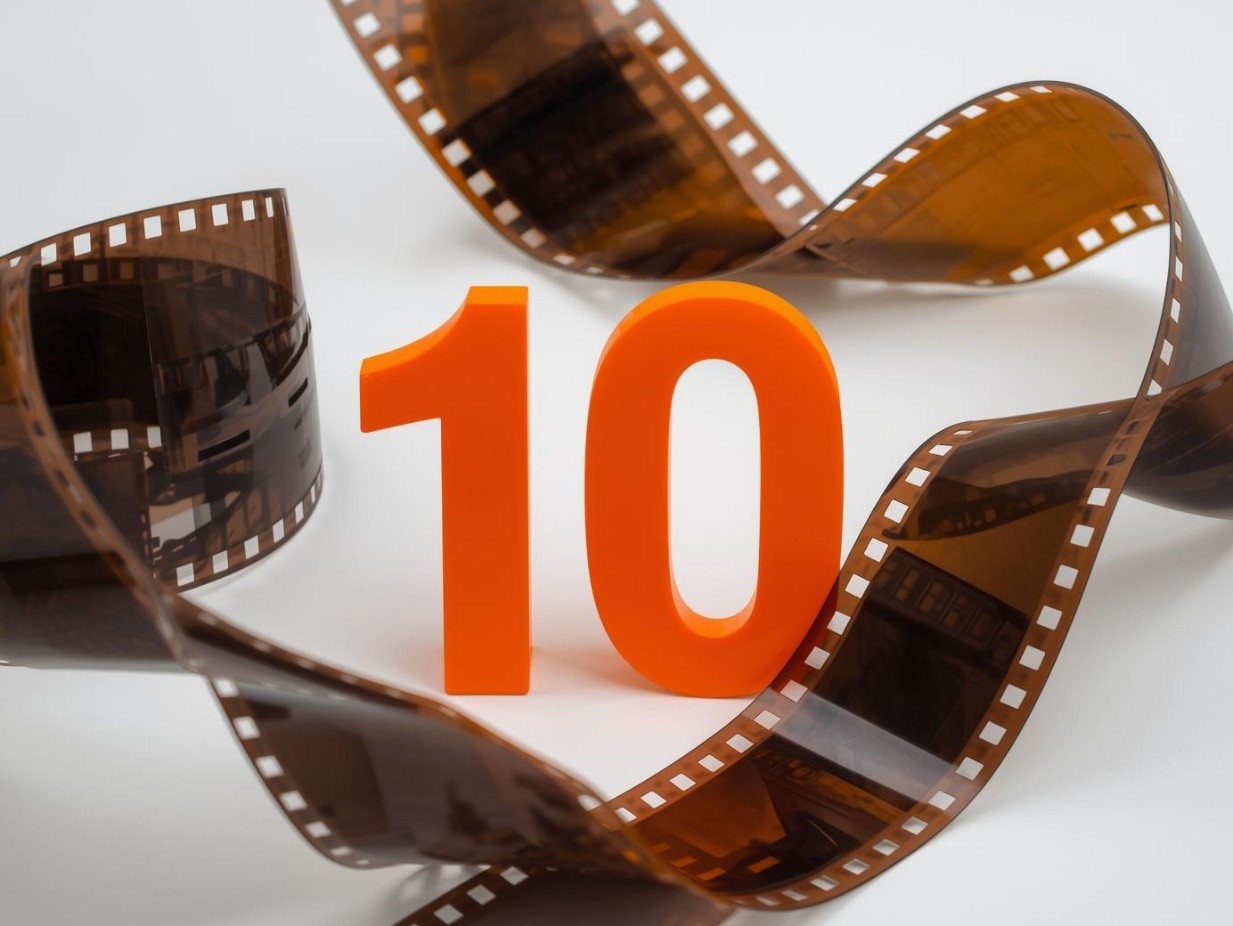 the number 10 wrapped within a film strip